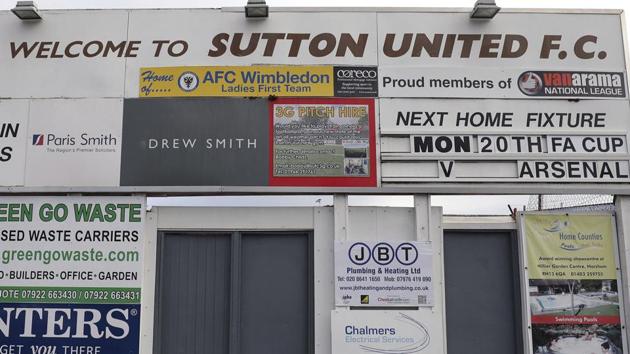 A sign advertising Sutton United's next fixture, which is against Arsenal FC on Monday at Gander Green Lane, London. Sutton United, the fifth-tier semi-professional team will play Arsene Wenger’s Arsenal, the 13-time English champions, after reaching the fifth round of the FA Cup competition for the first time in its 118-year history. (AP) A sign advertising Sutton United's next fixture, which is against Arsenal FC on Monday at Gander Green Lane, London. Sutton United, the fifth-tier semi-professional team will play Arsene Wenger’s Arsenal, the 13-time English champions, after reaching the fifth round of the FA Cup competition for the first time in its 118-year history. (AP)