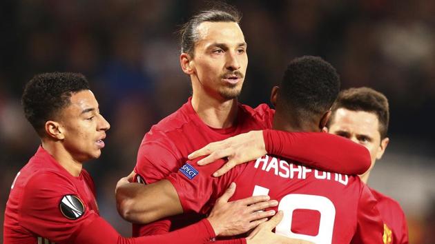 Manchester United's Zlatan Ibrahimovic (centre) celebrates with teammates after scoring during their Europa League round of 32 first leg match against St.-Etienne at the Old Trafford on Thursday. (AP) Manchester United's Zlatan Ibrahimovic (centre) celebrates with teammates after scoring during their Europa League round of 32 first leg match against St.-Etienne at the Old Trafford on Thursday. (AP)