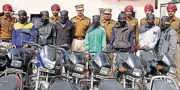 The accused with impounded vehicles in police custody on Friday in Ludhiana.(JS Grewal /Hindustan Times)