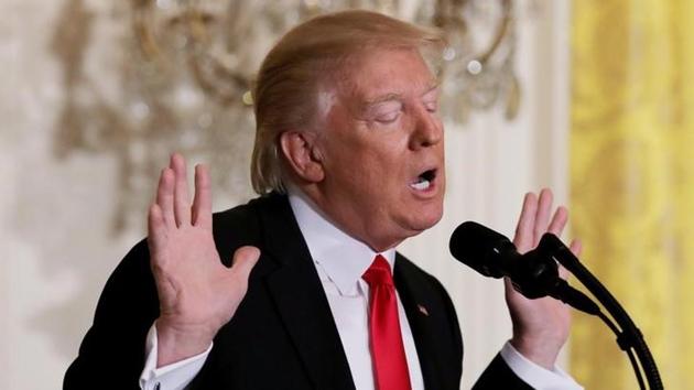 US President Donald Trump reacts to a question from reporters during a lengthy news conference at the White House in Washington.(Reuters)
