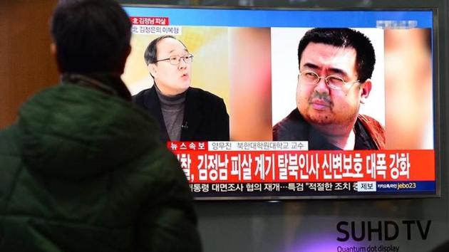 People watch a TV screen broadcasting a news report on the assassination of Kim Jong Nam, the older half brother of the North Korean leader Kim Jong Un, at a railway station in Seoul, South Korea. (Reuters) People watch a TV screen broadcasting a news report on the assassination of Kim Jong Nam, the older half brother of the North Korean leader Kim Jong Un, at a railway station in Seoul, South Korea. (Reuters)