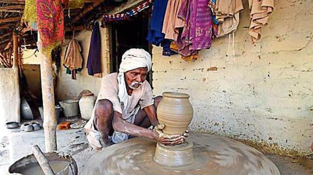 Johri Lal, brother of Bhagwati Prajapati who died of hunger, does pottery for a living. Congress vice-president Rahul Gandhi visited the family in UP’s Nehri village in 2009.(Arun Sharma/HT Photo) Johri Lal, brother of Bhagwati Prajapati who died of hunger, does pottery for a living. Congress vice-president Rahul Gandhi visited the family in UP’s Nehri village in 2009.(Arun Sharma/HT Photo)