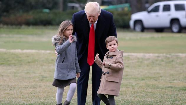 US President Donald Trump walks with his grandchildren Arabella and Joseph to Marine One upon his departure from the White House in Washington, US on February 17, 2017. (Carlos Barria / REUTERS)