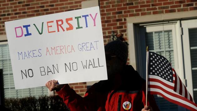 A man protests outside of Republican Rep. Mike Bishop's office on February 13, 2017 in Brighton, Michigan.(AFP File)