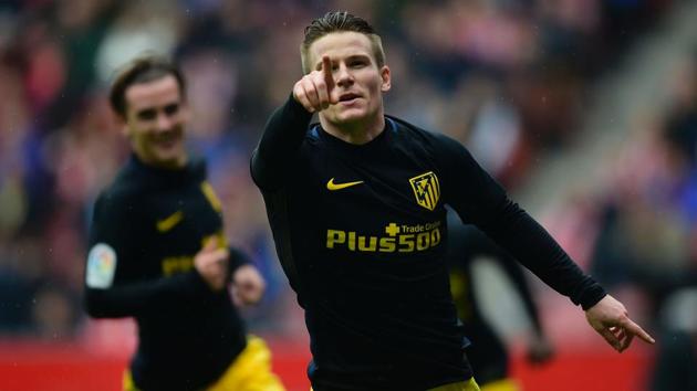Atletico Madrid forward Kevin Gameiro celebrates after scoring a goal during the La Liga match against Sporting Gijon. (AFP) Atletico Madrid forward Kevin Gameiro celebrates after scoring a goal during the La Liga match against Sporting Gijon. (AFP)