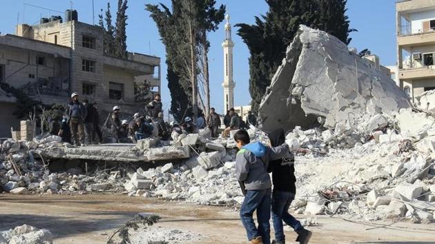 Children walk at the site hit by airstrikes in the rebel-held city of Idlib, Syria. (Reuters File Photo) Children walk at the site hit by airstrikes in the rebel-held city of Idlib, Syria. (Reuters File Photo)