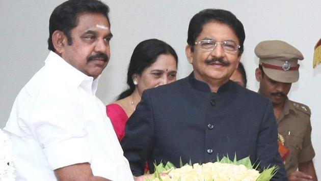 Edappadi K Palaniswami gets a bouquet from governor CH Vidyasagar Rao after taking oath as the chief minister of Tamil Nadu at the Raj Bhavan in Chennai on Thursday.(HT Photo)