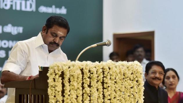 Tamil Nadu chief minister E Palaniswami after taking the oath of secrecy administered by governor Ch Vidyasagar Rao during the swearing-in ceremony at Raj Bhavan in Chennai on Thursday. (PTI) Tamil Nadu chief minister E Palaniswami after taking the oath of secrecy administered by governor Ch Vidyasagar Rao during the swearing-in ceremony at Raj Bhavan in Chennai on Thursday. (PTI)