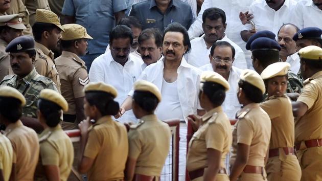 Tamil Nadu opposition leader MK Stalin leaves the assembly premises after the ruckus during the vote of confidence in Chennai on Saturday.(PTI)