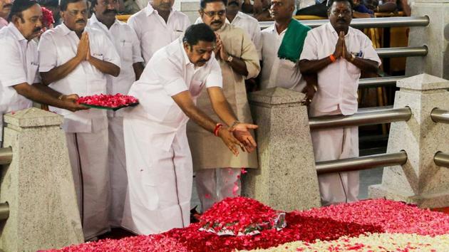Tamil Nadu chief minister Edappadi K Palaniswami offers floral tributes at late J Jayalalithaa's memorial at the Marina beach in Chennai.(PTI File)