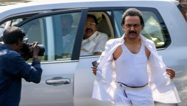 DMK leader MK Stalin shows his torn shirt after the ruckus during the vote of confidence in Chennai on Saturday. (PTI) DMK leader MK Stalin shows his torn shirt after the ruckus during the vote of confidence in Chennai on Saturday. (PTI)