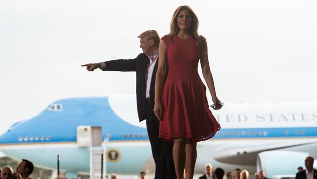 US President Donald Trump and First Lady Melania Trump arrive at a rally at the Orlando Melbourne International Airport on Saturday in Melbourne, Florida. (AFP) US President Donald Trump and First Lady Melania Trump arrive at a rally at the Orlando Melbourne International Airport on Saturday in Melbourne, Florida. (AFP)