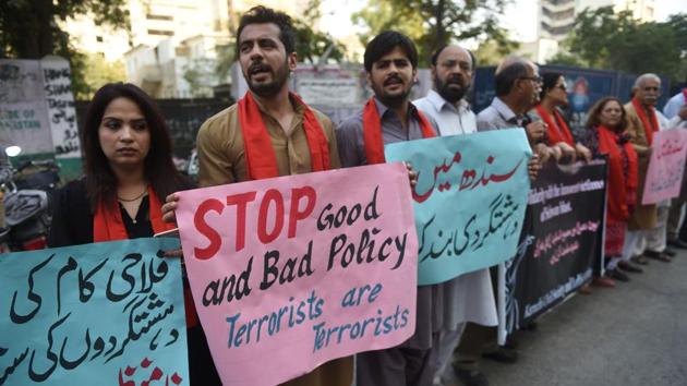 Pakistani civil society activists take part in a protest for peace in Karachi on February 18, 2017, following a deadly bomb attack on the shrine of 13th century Muslim Sufi saint Lal Shahbaz Qalandar in the town of Sehwan.(AFP Photo) Pakistani civil society activists take part in a protest for peace in Karachi on February 18, 2017, following a deadly bomb attack on the shrine of 13th century Muslim Sufi saint Lal Shahbaz Qalandar in the town of Sehwan.(AFP Photo)