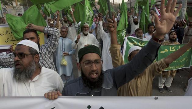 People protest against a recent suicide attack at Lal Shahbaz Qalandar Sufi shrine in Sindh province that claimed 88 lives. (AP) People protest against a recent suicide attack at Lal Shahbaz Qalandar Sufi shrine in Sindh province that claimed 88 lives. (AP)