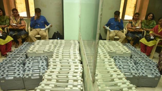 DOUBLE TROUBLE: Just like this reflection, the work too has doubled for the staff. (PRATHAM GOKHALE/HT)