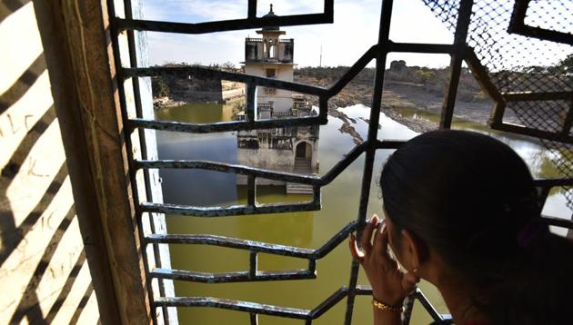 A visitor looks at the water palace inside the mahal. (Raj K Raj/HT PHOTO)