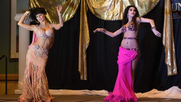 Belly Dancer Kristina Mnoyan of Russia (R) competes in the Taxsim category of the 2017. (Mark RALSTON / AFP) Belly Dancer Kristina Mnoyan of Russia (R) competes in the Taxsim category of the 2017. (Mark RALSTON / AFP)
