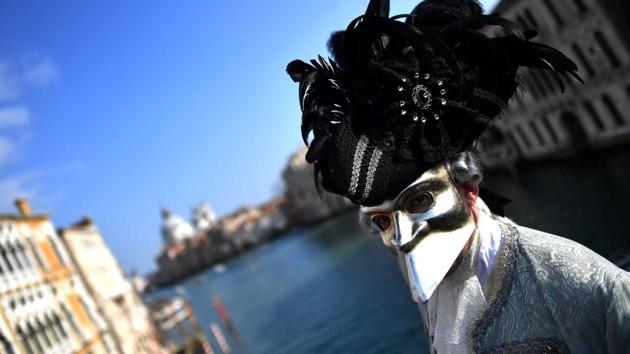 The Carnival was first held in Venice in the 11th century and consisted of over two months of revelry, until it fell into decline during the 18th century. (Alberto PIZZOLI / AFP)