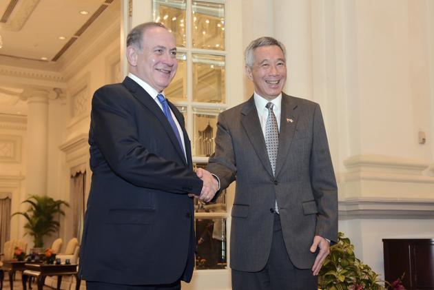Israeli PM Benjamin Netanyahu (left) poses with Singapore PM Lee Hsien Loong at the Istana presidential palace in Singapore on Monday. (AP) Israeli PM Benjamin Netanyahu (left) poses with Singapore PM Lee Hsien Loong at the Istana presidential palace in Singapore on Monday. (AP)