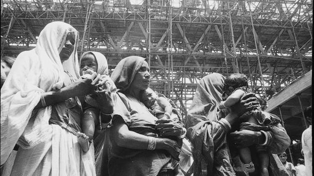 In this photo taken on 19 July 1972 women labourers and their children visit a function organized by the Trade fair Authority of India in honour of construction workers and their families who worked day and night to construct the exhibition grounds for the Asiad 72 an International Exhibition, for various participating industries across the globe. (KK Chawla/HT File Photo)