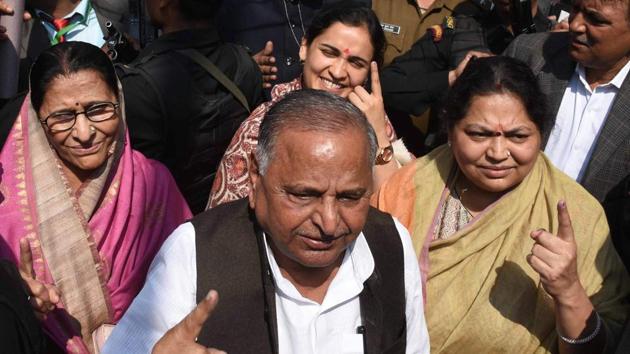 Samajwadi Party patron Mulayam Singh Yadav with his wife Sadhana Yadav (right) and daughter-in-law Aparna Yadav (behind) after casting vote during the third phase of UP Assembly elections in Saifai, Etawah on Sunday. (PTI) Samajwadi Party patron Mulayam Singh Yadav with his wife Sadhana Yadav (right) and daughter-in-law Aparna Yadav (behind) after casting vote during the third phase of UP Assembly elections in Saifai, Etawah on Sunday. (PTI)