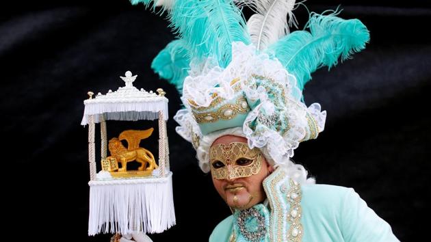 The carnival was a pressure valve to ease class tensions, allowing the poor, for a brief and controlled period, to break Venice’s rigid, oligarchical social order. (Alessandro Bianchi / REUTERS)