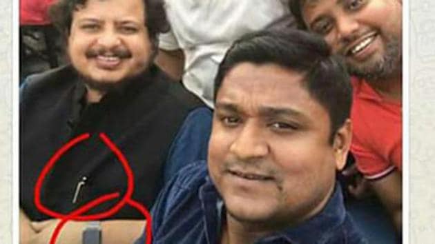 Photographs put up on social media pointing at the pen jutting out of Ritabrata Banerjee’s pocket and his watch during the East Bengal-Mohun Bagan Derby faceoff in Siliguri on January 12. (Social media) Photographs put up on social media pointing at the pen jutting out of Ritabrata Banerjee’s pocket and his watch during the East Bengal-Mohun Bagan Derby faceoff in Siliguri on January 12. (Social media)