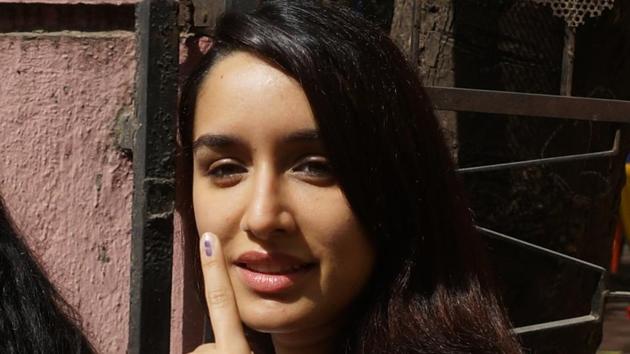 BRIGHT AND SUNNY: Actor Shraddha Kapoor flaunts her inked finger. (prodip guha/ht photo) 
