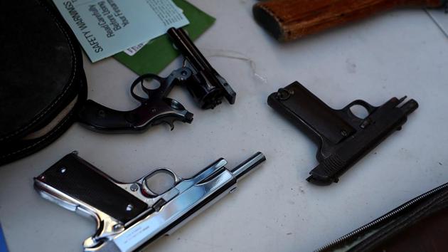 The man pulled a semi-automatic handgun from his waistband and opened fire at the officers. (AFP File Photo) The man pulled a semi-automatic handgun from his waistband and opened fire at the officers. (AFP File Photo)