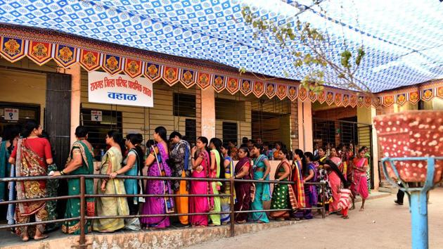 People cast their vote during Zilla Parishad & Panchayat Samiti elections at Wahal Village, Panvel in Navi Mumbai on Tuesday.(BACHCHAN KUMAR)