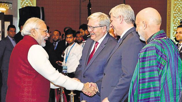 Prime Minister Narendra Modi with the former President of the Islamic Republic of Afghanistan, Hamid Karzai,former Prime Minister of Canada, Stephen Harper and Former Australian Prime Minister Kevin Rudd at the Opening Session of the Second Raisina Dialogue, in New Delhi on January 17.(PTI)