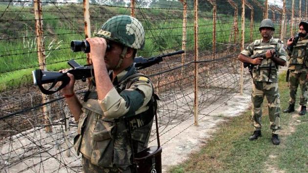 BSF personnel patrol along the India and Pakistan international border. (PTI File Photo) BSF personnel patrol along the India and Pakistan international border. (PTI File Photo)