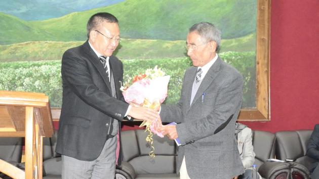 Former Nagaland chief minister TR Zeliang (left) presents a bouquet to Shurhozelie Liezietsu (right). (File Photo) Former Nagaland chief minister TR Zeliang (left) presents a bouquet to Shurhozelie Liezietsu (right). (File Photo)
