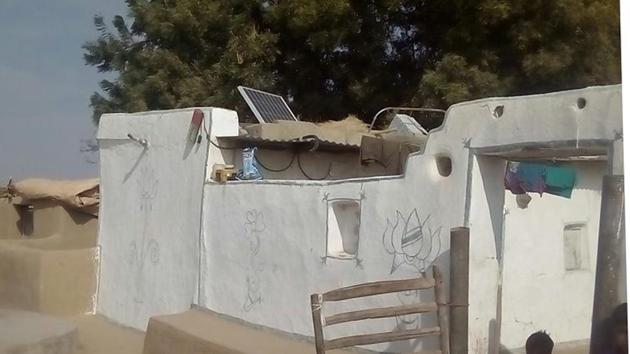 A hut with solar power panel in Barmer village. (HT Photo) A hut with solar power panel in Barmer village. (HT Photo)