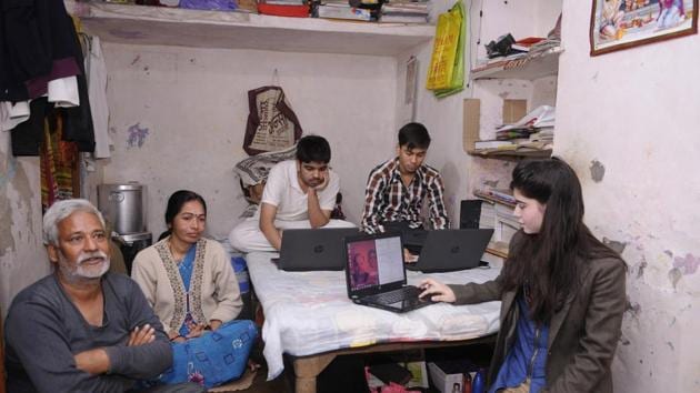 The laptops are the window to the world for Nidhi, 20, Pulkit, 17, and Vinay, 16, who are otherwise cooped up in their two-room rented house. (Deepak Gupta/ HT Photo) The laptops are the window to the world for Nidhi, 20, Pulkit, 17, and Vinay, 16, who are otherwise cooped up in their two-room rented house. (Deepak Gupta/ HT Photo)