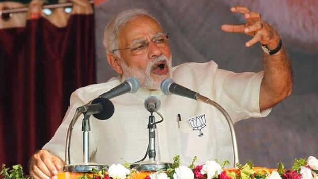 Prime Minister Narendra Modi gestures as he addresses an election campaign rally in Allahabad.(Reuters File Photo)