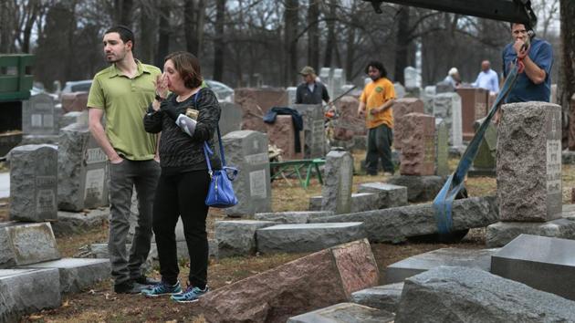 Vandals have damaged or tipped over as many as 200 headstones at the Jewish cemetery in suburban St. Louis, leaving the region's Jewish community shaken and anxious. (AP Photo) Vandals have damaged or tipped over as many as 200 headstones at the Jewish cemetery in suburban St. Louis, leaving the region's Jewish community shaken and anxious. (AP Photo)