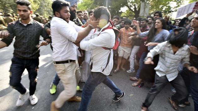 By 5.30pm, teachers and student organisers of Tuesday’s event and some of their supporters who were holed up inside college campus were taken out in police buses and sent to Metro stations. (Raj K Raj/HT PHOTO)