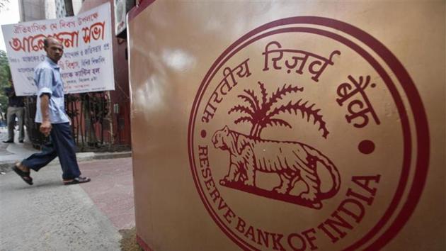 A man walks past the RBI office in Kolkata. (REUTERS File) A man walks past the RBI office in Kolkata. (REUTERS File)
