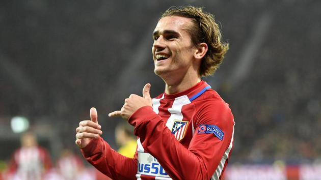 Atletico de Madrid's Antoine Griezmann celebrates after scoring his side's second goal against Bayer Leverkusen in the UEFA Champions League. (AP) Atletico de Madrid's Antoine Griezmann celebrates after scoring his side's second goal against Bayer Leverkusen in the UEFA Champions League. (AP)