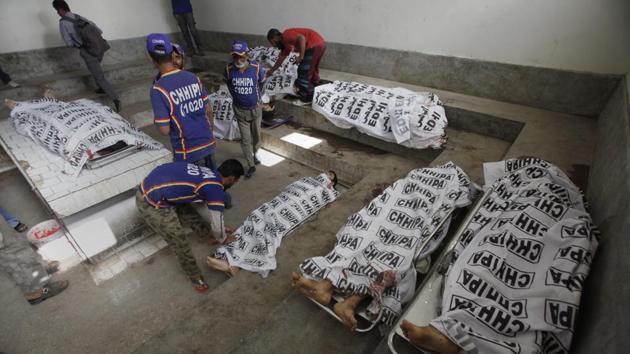 Bodies of alleged militants killed in an operation by security forces are tended to by workers form the Chhipa Welfare Association, at a mortuary, in Karachi, Pakistan, Wednesday, Feb. 22, 2017. Rao Anwar, a police official in Karachi, said eight Taliban-linked militants were killed in the raid. Pakistan said it will send paramilitary forces to crack down on Islamic militants in the Punjab province, a move that the ruling party of Prime Minister Nawaz Sharif had long rejected because of opposition among his Islamist supporters. (AP Photo/Fareed Khan) (AP) Bodies of alleged militants killed in an operation by security forces are tended to by workers form the Chhipa Welfare Association, at a mortuary, in Karachi, Pakistan, Wednesday, Feb. 22, 2017. Rao Anwar, a police official in Karachi, said eight Taliban-linked militants were killed in the raid. Pakistan said it will send paramilitary forces to crack down on Islamic militants in the Punjab province, a move that the ruling party of Prime Minister Nawaz Sharif had long rejected because of opposition among his Islamist supporters. (AP Photo/Fareed Khan) (AP)
