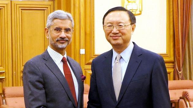 Foreign secretary S Jaishankar (L) with top Chinese state councillor Yang Jiechi in Beijing on Tuesday.(PTI Photo)