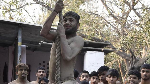 Wrestlers during training at Krishan Pehalwan Akhaara (P and T) facility in Amritsar on Wednesday. (Gurpreet Singh/HT Photo)