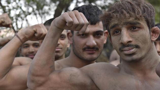 Wrestlers at Krishan Pehalwan Akhaara (P and T) facility in Amritsar on Wednesday. (Gurpreet Singh/HT Photo)