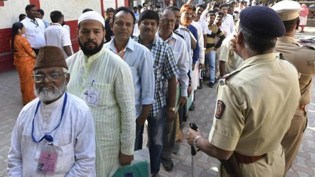 Polling agents in a queue outside a counting centre at Dr Antonia High School in Dadar, Mumbai, on Thursday. (Kunal Patil/HT Photo) Polling agents in a queue outside a counting centre at Dr Antonia High School in Dadar, Mumbai, on Thursday. (Kunal Patil/HT Photo)
