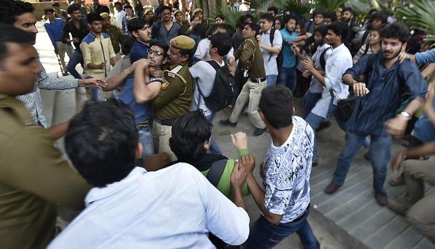 Students clash near Maurice Nagar police station on Wednesday.(Raj K Raj/HT PHOTO)