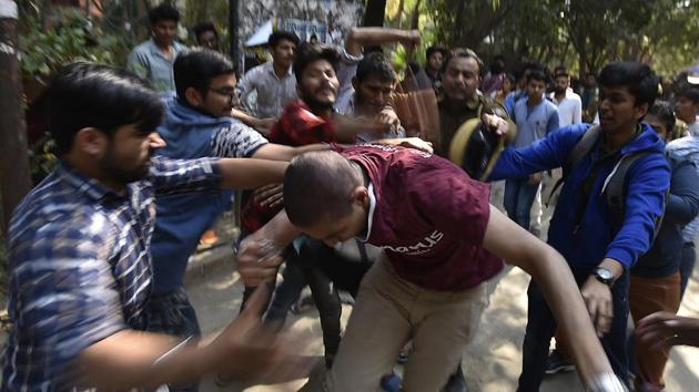 Akhil Bharatiya Vidyarthi Parishad activists clash with students of Ramjas College on Wednesday, February 22. The student body has upped the ante in the last two years, ever since the Narendra Modi government came to power.(Raj K Raj/HT PHOTO)