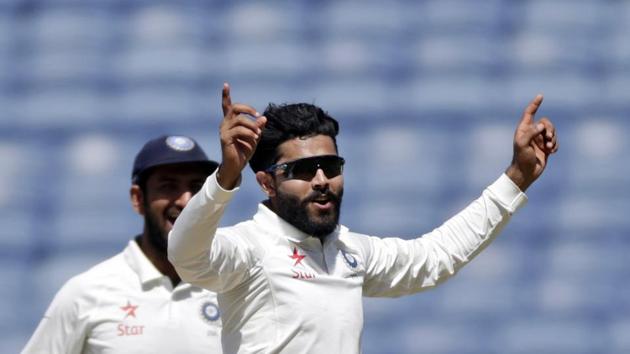 Ravindra Jadeja celebrates the dismissal of Australia's Peter Handscomb. (AP)
