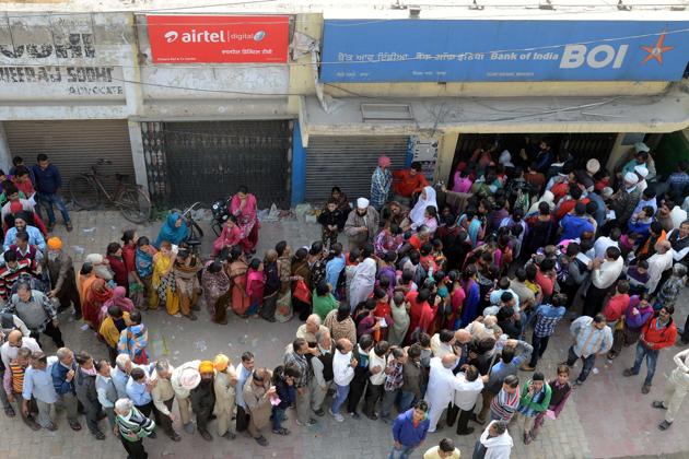 Indian people queue outside a bank as they wait to deposit and exchange 500 and 1000 rupee notes in Amritsar (AFP) Indian people queue outside a bank as they wait to deposit and exchange 500 and 1000 rupee notes in Amritsar (AFP)