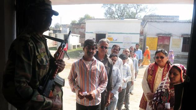 Voters wait in a queue for their turn to vote at a polling station in the Naini area on the outskirts of Allahabad during the fourth phase of Uttar Pradesh state assembly elections.(AFP Photo) Voters wait in a queue for their turn to vote at a polling station in the Naini area on the outskirts of Allahabad during the fourth phase of Uttar Pradesh state assembly elections.(AFP Photo)